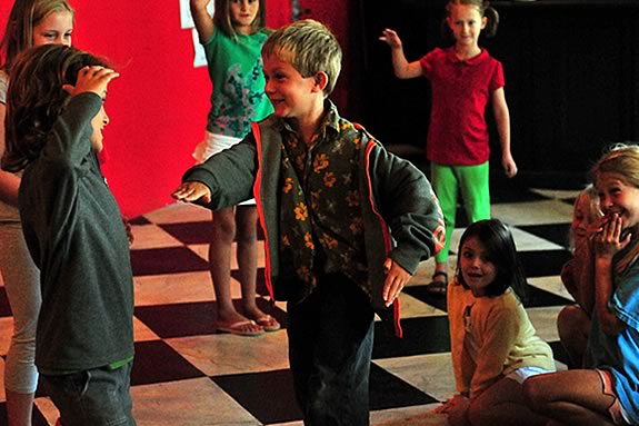 The Youth Acting Workshop at Gloucester Stage Company Children's Class rehearse a scene in the 'Enchanted Forest'. Ian Buchanan foreground Rehearsing for 'The Enchanted Forest' Ian Buchanan Gloucester Stage Company