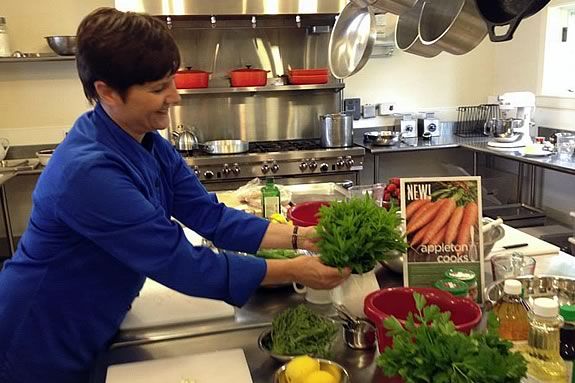 Chef-teacher Carolyn Grieco preparing the work stations for the hands-on workshop Chef-teacher Carolyn Grieco preparing the work stations for the hands-on workshop