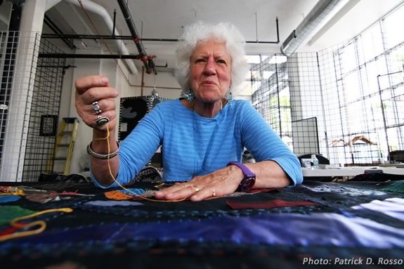 Clara Wainwright works on the Mending Boston Collage Quilt. Photo: PD Rosso