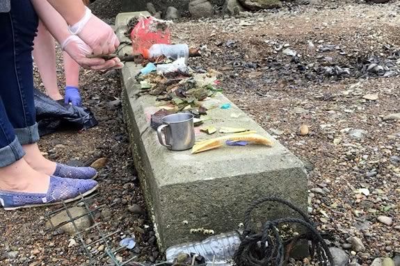 CoastSweep volunteers catalog marine debris collected at Cripple Cove in Gloucester Massachusetts