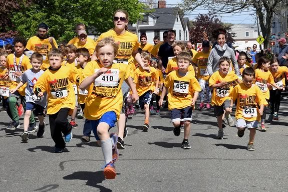 The Motif #1 5k and kids fun run takes place on Motif #1 Day in Rockport, Massachusetts The Motif #1 5k and kids fun run takes place on Motif #1 Day in Rockport, Massachusetts