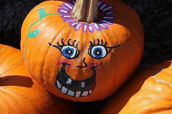 Pumpkin painting for kids at Rowley Public Library in Massachusetts.