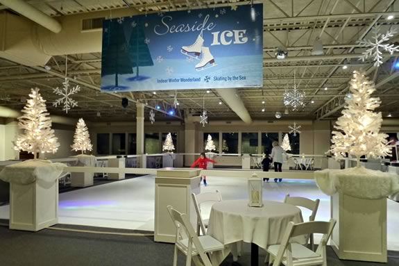 Glide around an indoor artificial ice rink as you skate to festive music, surrounded by sparkling snowflakes, mirror balls, and breathtaking views of the ocean in Salisbury Massachusetts.. Glide around an indoor artificial ice rink as you skate to festive music, surrounded by sparkling snowflakes, mirror balls, and breathtaking views of the ocean.
