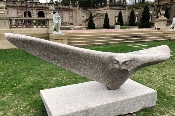 Red Owl sculpture by Andreas von Huene part of the Spirit in Place Exhibit at the Crane Estate in Ipswich Massachusetts