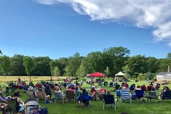 Stevens-Coolidge Estate hosts the Notch Travelling Bier Garden weekly on Fridays for their Summer Concert Series in North Andover Massachusetts