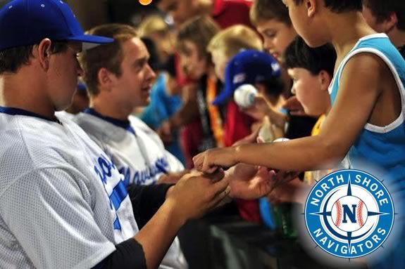 Players from the North Shore Navigatgors sign balls for fans!